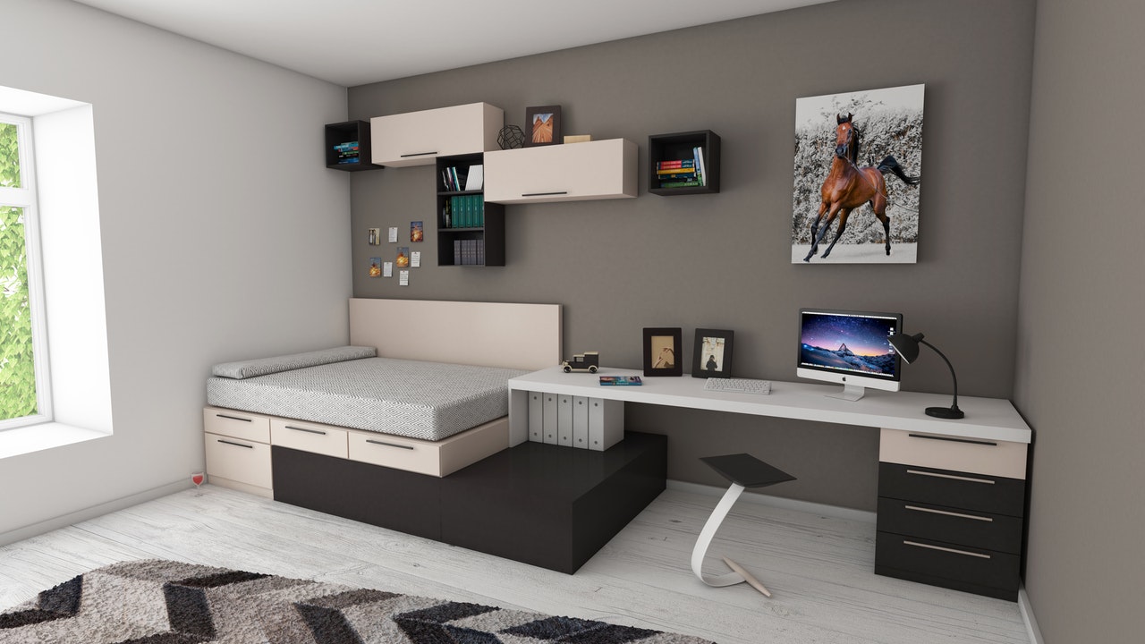 a bedroom with furniture